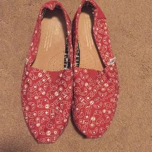 Toms retro video game shoes.
